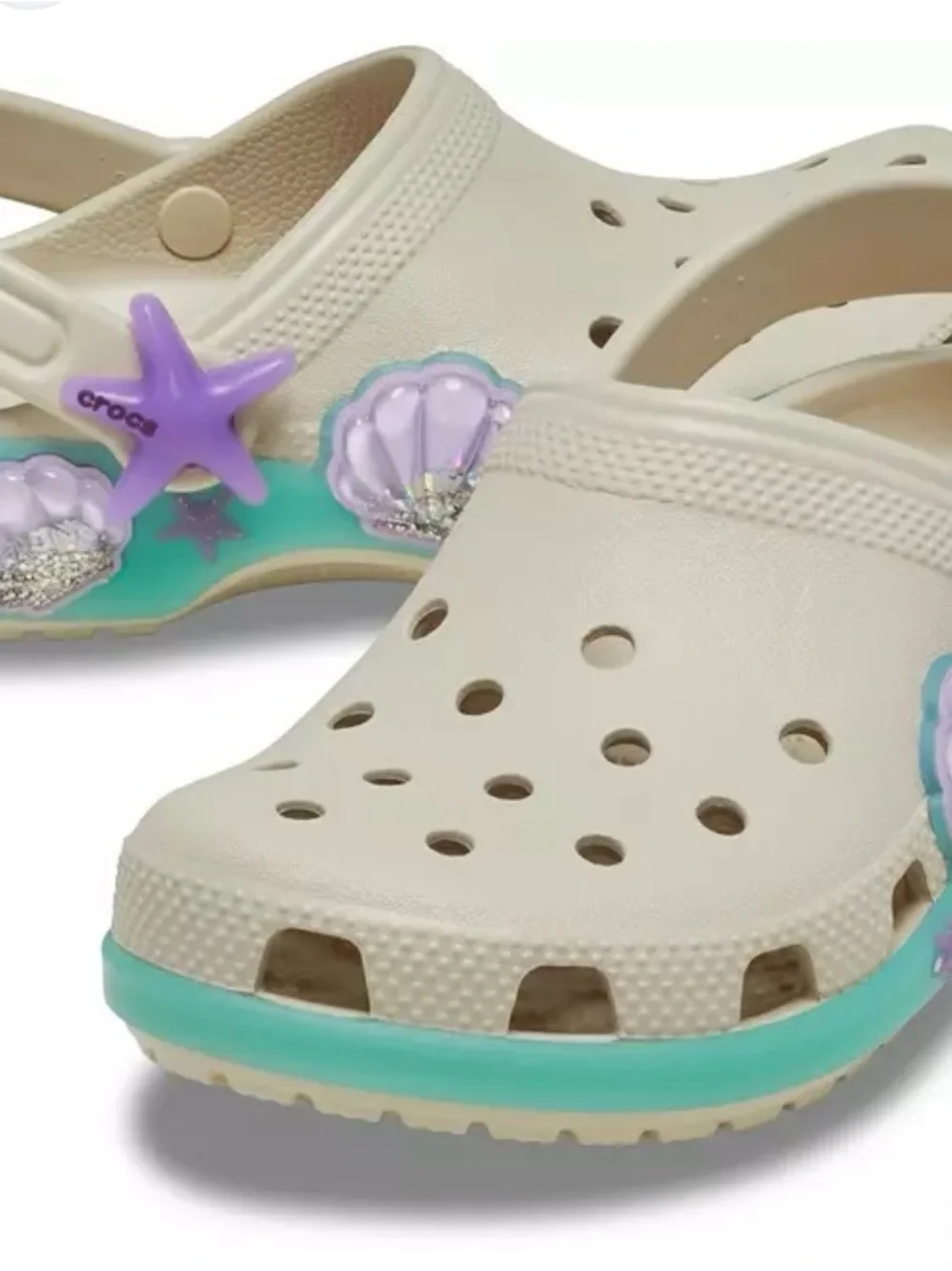 CROCS Kids Cream Clogs with Aqua Trim and Purple Mermaid Charms